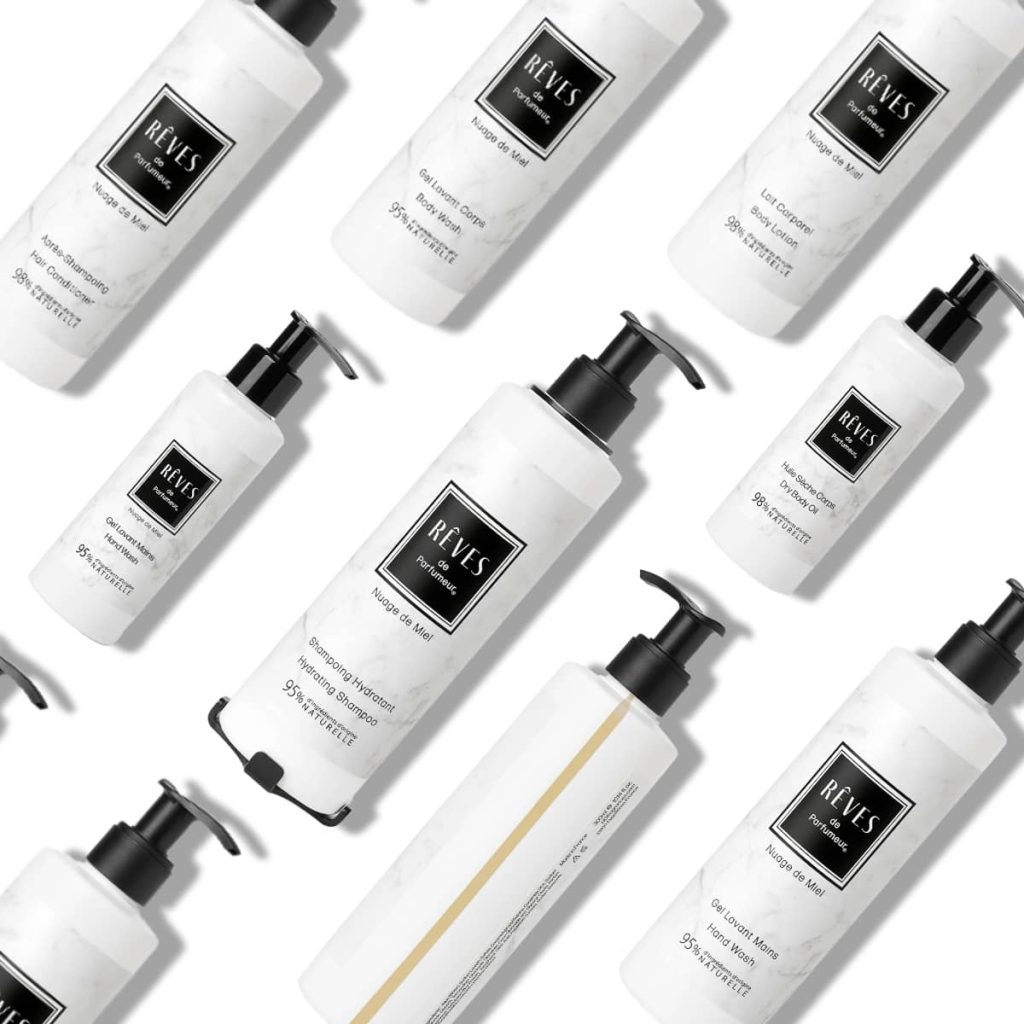 Flacons distributeurs de shampoing, gel douche, savon liquide pour l'hôtellerie signés Rêves de Parfumeur "Nuage de Miel"